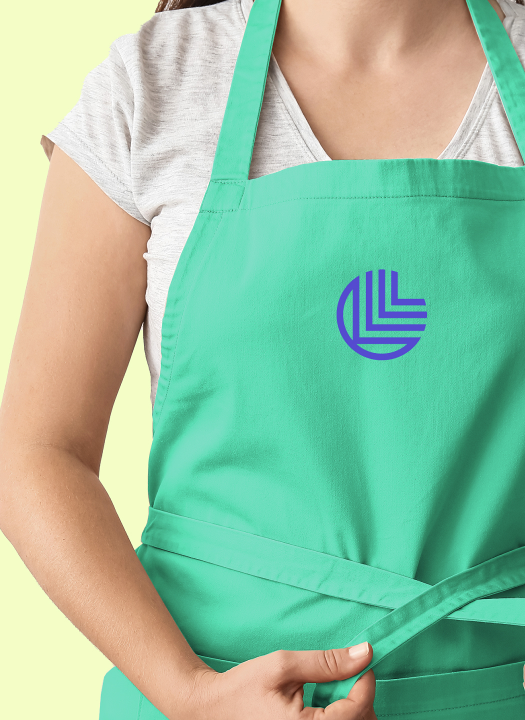 A person wearing an apron with the Leanpath logo on it